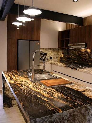 Black and gold granite kitchen island